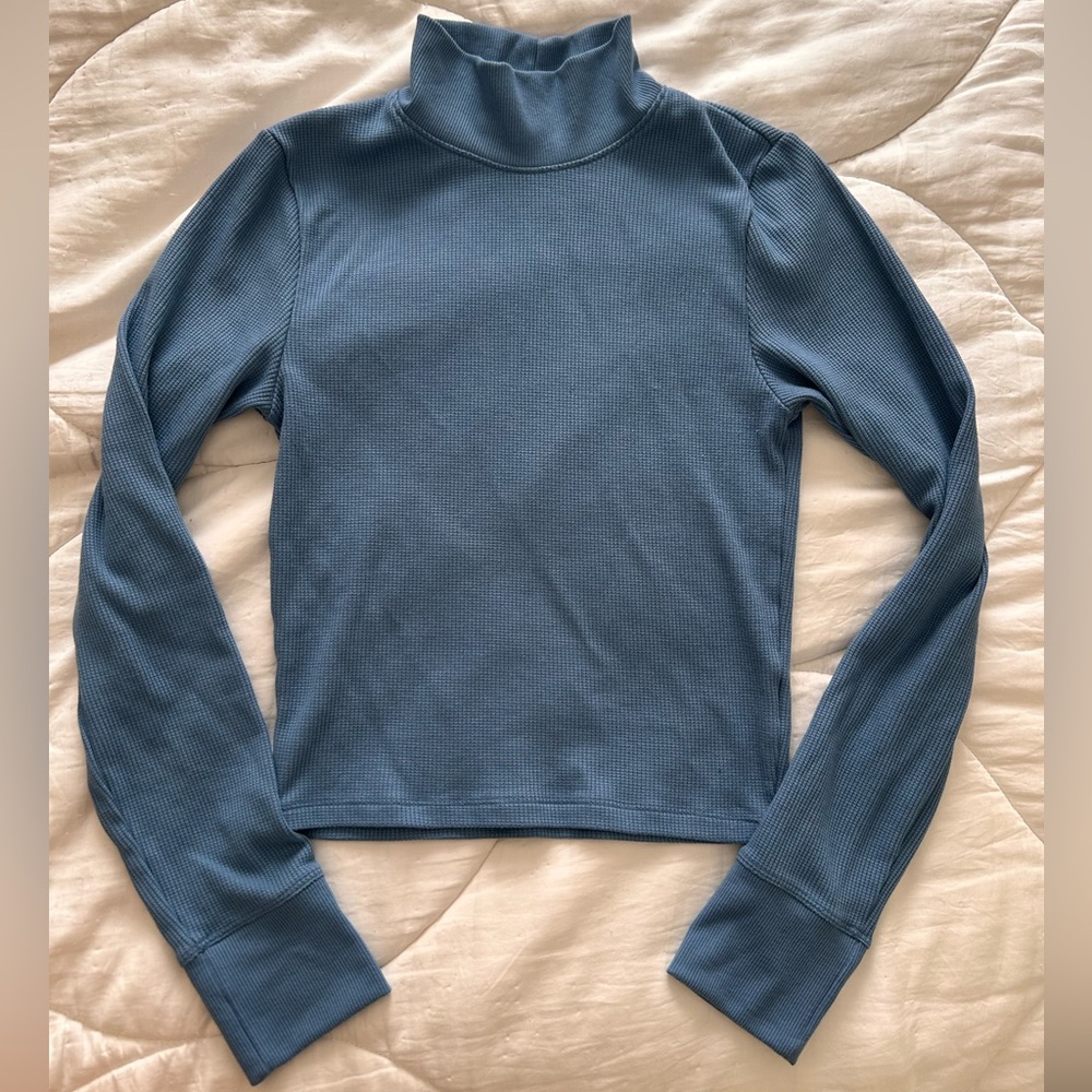 Blue waffle-knit turtleneck